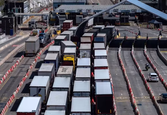 Masked protesters block Dover port roads